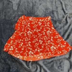 Floral reddish/orange wrap around skirt